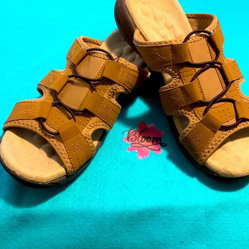 Tan Sandals by comfort view size 11 wide, only worn a few times. 1 inch heal